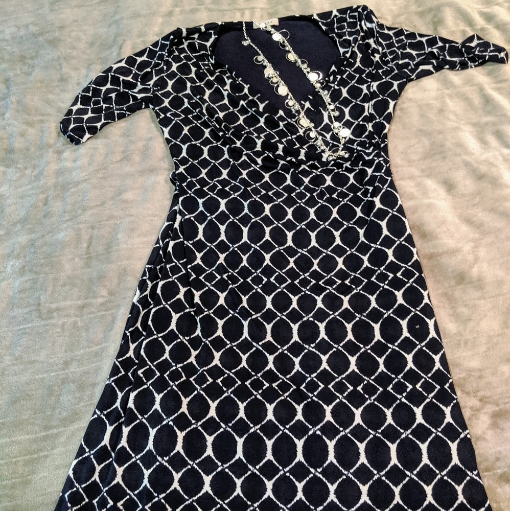 Navy and off white maternity dress.
